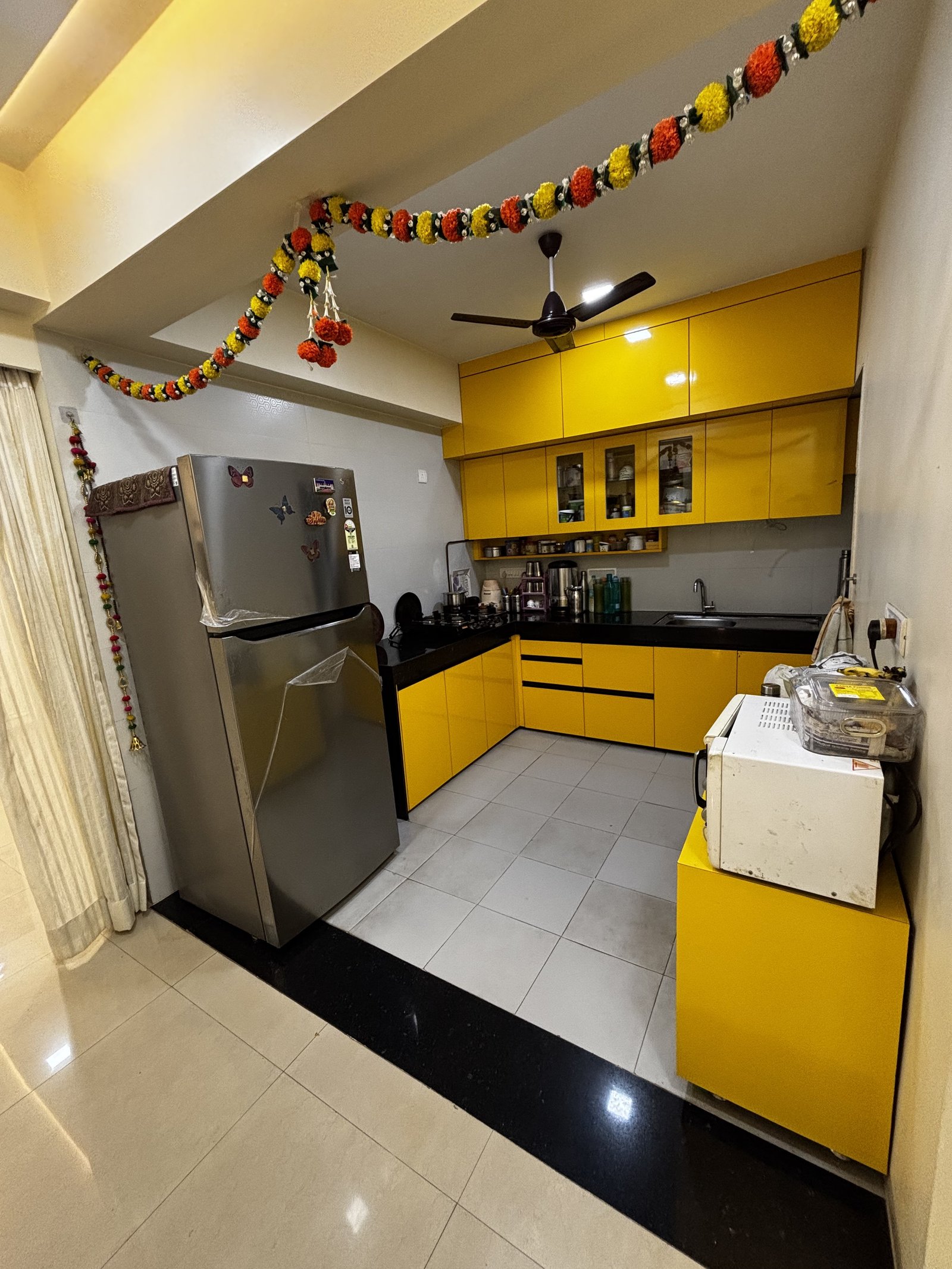 Wide view of the modular kitchen and fitted cabinets