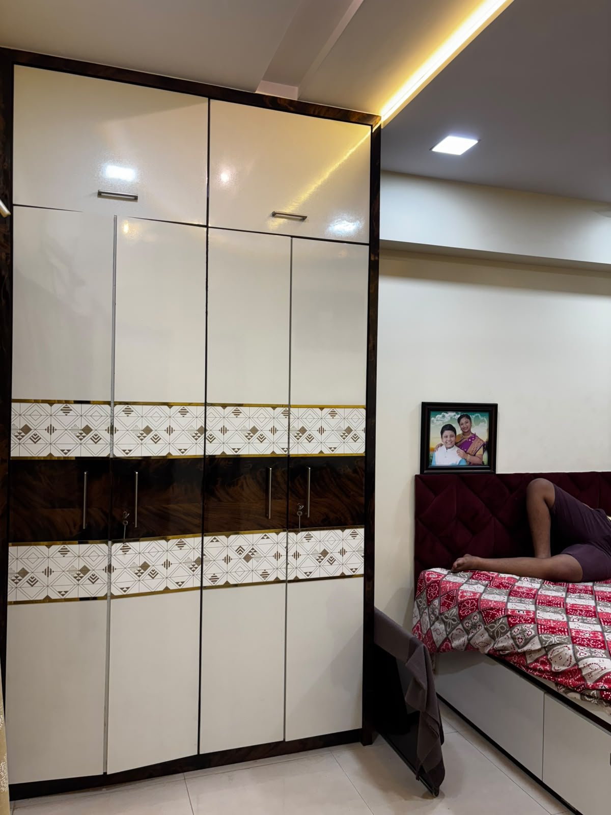 Parent bedroom interior with decorative ceiling lighting