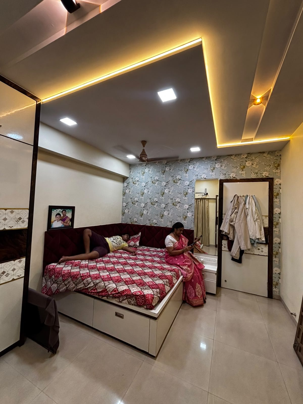 Parent bedroom wardrobe and bed in a coordinated interior